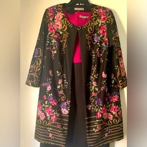 Jacket and dress can come apart if needed. Dress is a size 16 W.